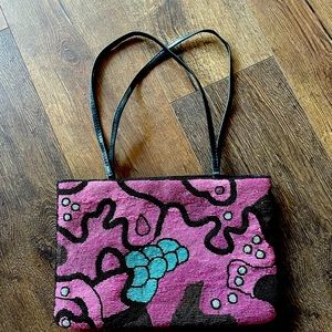 Standout from the crowd with this beaded bag